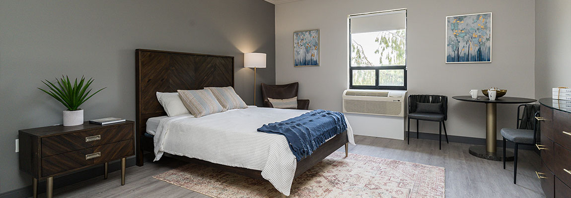 Comfortable and spacious suites with modern furnishings and natural light.