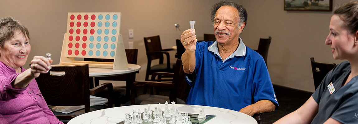 A group of seniors enjoying a recreational activity that supports their cognitive strengths.